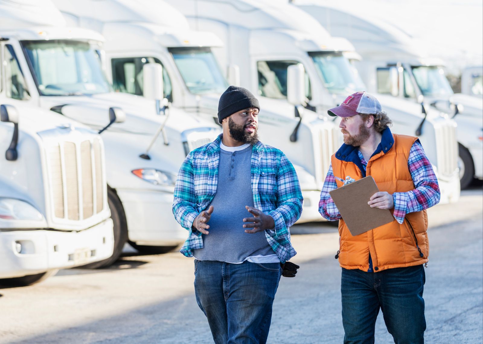 Compliance officer working with truck driver